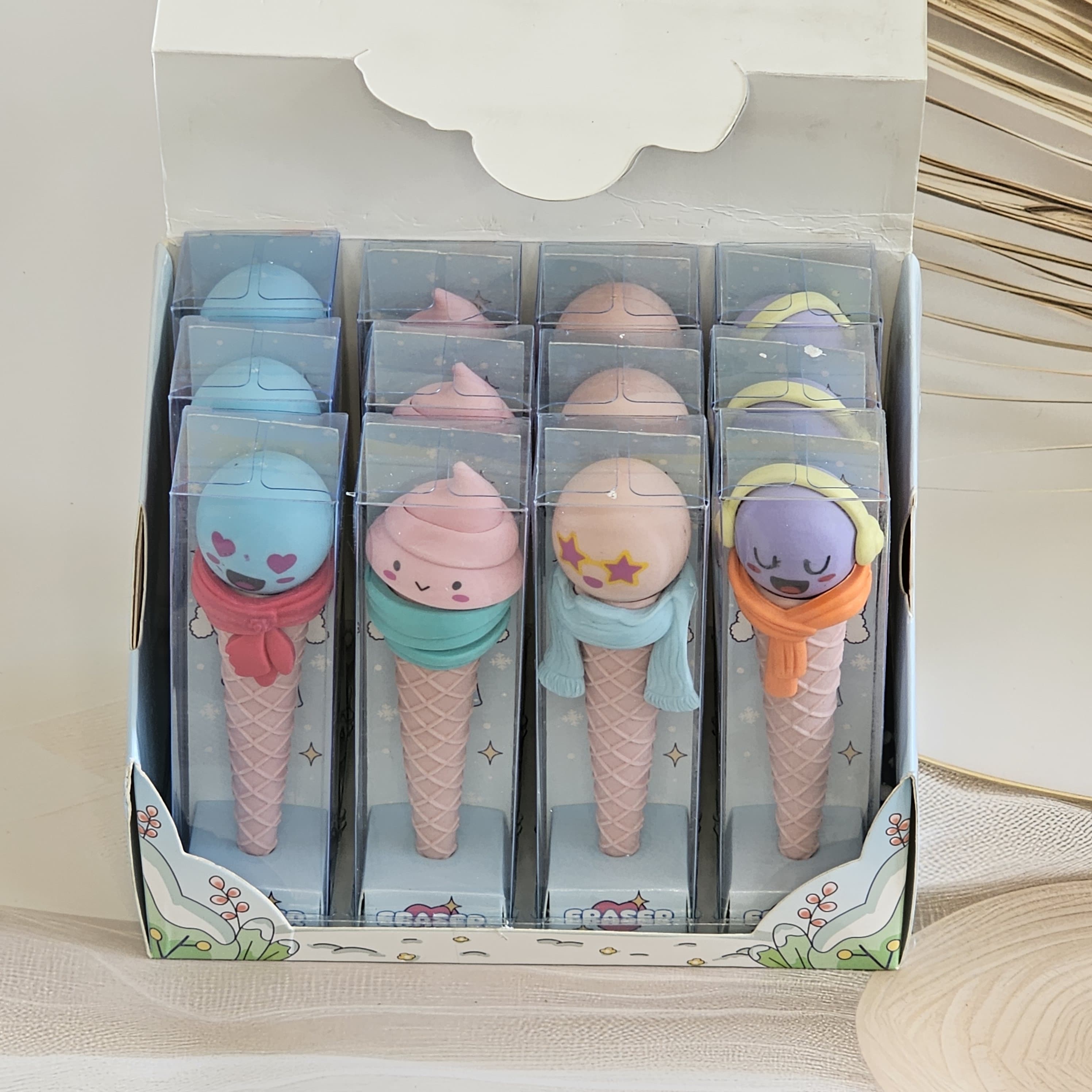 Novelty erasers shaped like ice cream cones with cartoon faces, fun and functional for kids, www.usmile.toys.